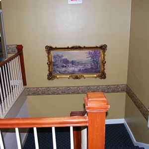 Staircase leading to the second floor guest rooms.