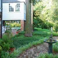 The three-acre estate garden features over 100 camellias.