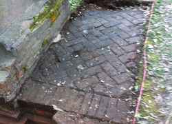 The black area on bricks is evidence of fire.