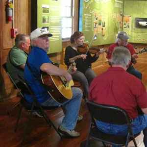 Natchez Trace String Band performing at  the Parkway Information Cabin.