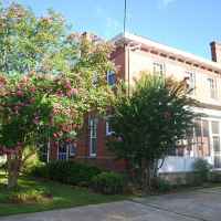 Rear view of Maple Terrace Inn from the guest parking area.