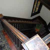 Maple Terrace Inn - Staircase view from upstairs.