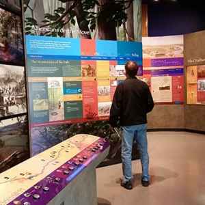 Visitor learning about the Natchez Trace at the Parkway Visitor Center in Tupelo.