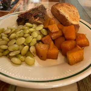 Pork loin, candied sweet potatoes, butter beans and cornbread