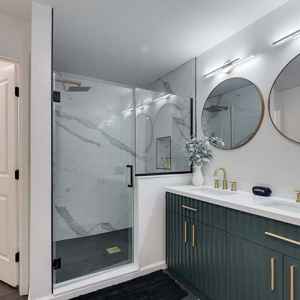 Master Bathroom - oversized shower with body jets and a rain head, double vanity and separate toilet room